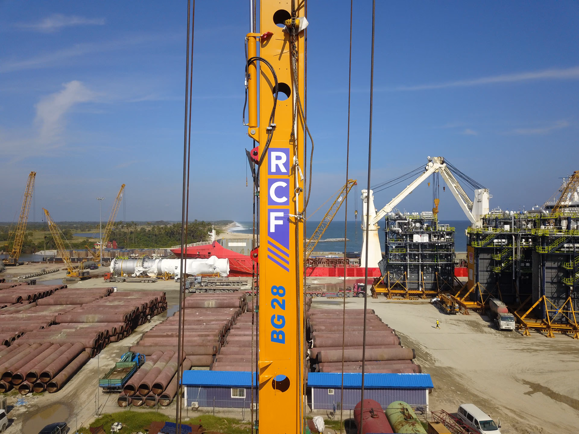 An RCF-branded piling rig on a quayside