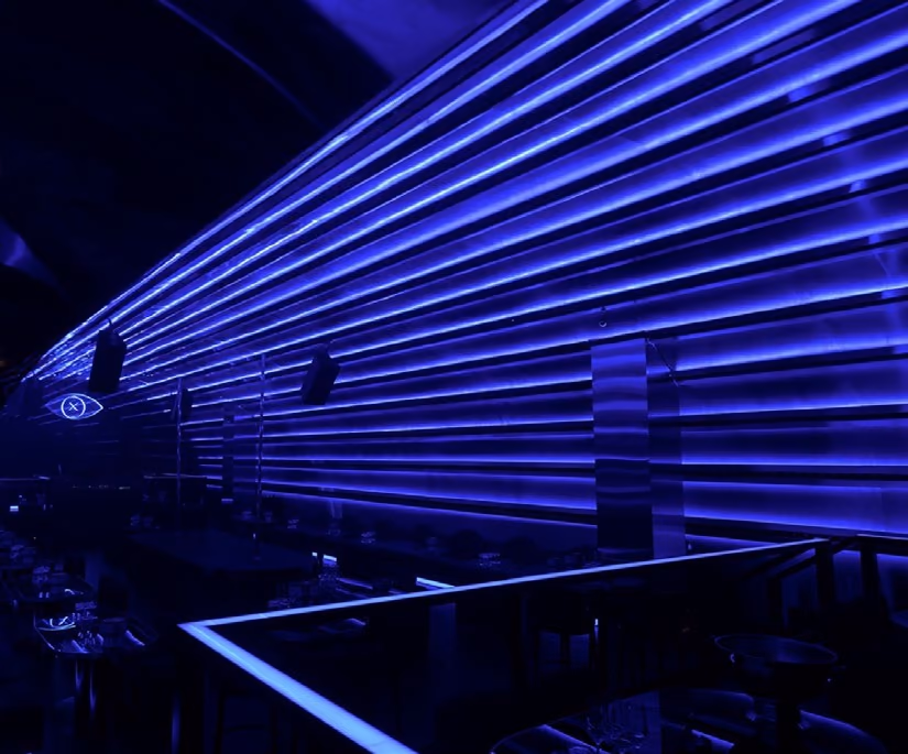 Blue light lines along a wall