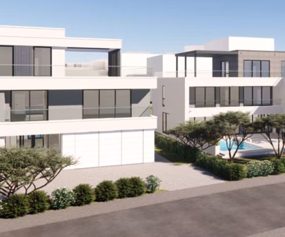 Lagos Twin Villas, a white two-storey villa with roof terraces