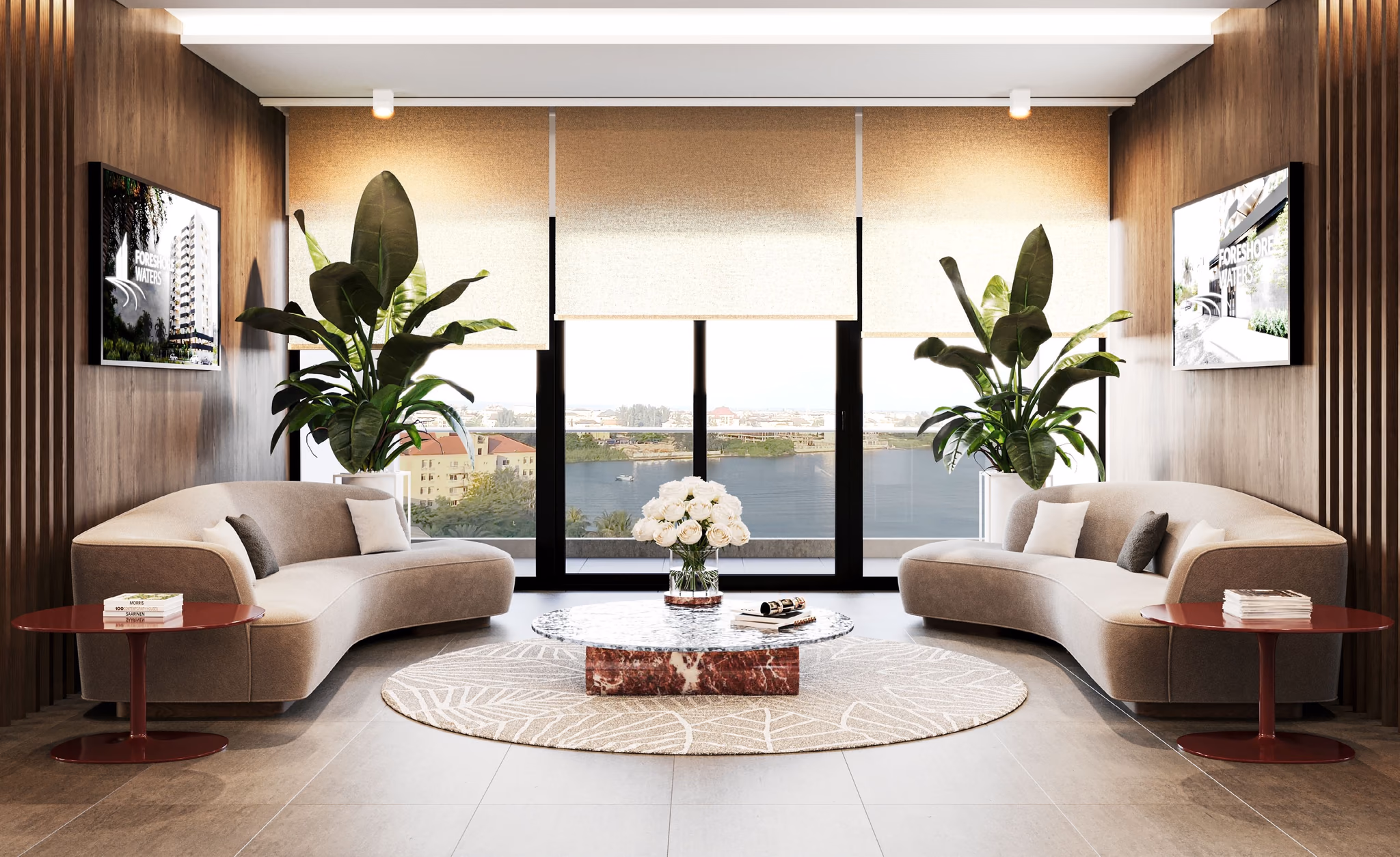 Office lounge with curved sofas facing a window over the water