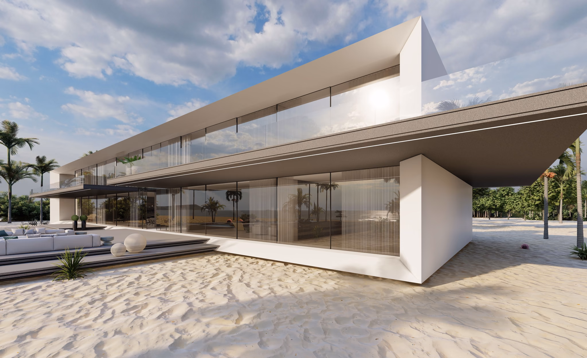 Low white beach house with a cantilevered roof over glazed rooms